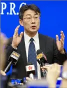  ?? ?? Gao Fu, then head of the Chinese Center for Disease Control and Prevention, speaks about a virus outbreak at the State Council Informatio­n Office in Beijing on Jan. 26. Experts believe many hundreds of thousands of people died in China’s wave of COVID-19.