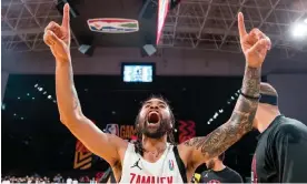  ?? Bacot/BAL/NBAE/Getty Images ?? Michael McKinney of the Zamalek celebrates after a game against the Clube Atlético Petroleos de Luanda in April at Hassan Mostafa Indoor Sports Complex. Photograph: Julien