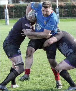  ?? ?? Ross High (blue) battled well against Strathmore before eventually going down to defeat