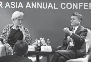  ?? XING GUANGLI / XINHUA ?? Jack Ma, founder and chairman of Alibaba Group, talk with IMF Managing Director Christine Lagarde on the sidelines of the Boao Forum on Monday.