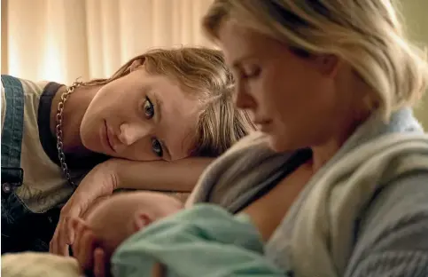 ?? AP ?? Both Mackenzie Davis and Charlize Theron are terrific in Tully.