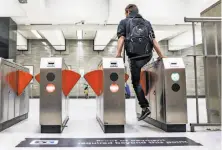  ?? Gabrielle Lurie / The Chronicle ?? A man jumps the turnstile at BART’s Civic Center Station. BART issued 3,813 fare citations from March through August.