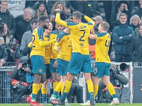  ?? Picture: AP. ?? Celtic players celebrate after in-form striker Odsonne Edouard’s opening goal in Copenhagen.