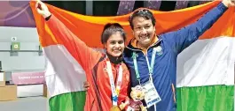  ??  ?? Manu Bhaker (left) created a junior world record in the women’s 10m air pistol event