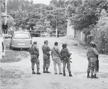  ?? FOTO: AGENCIAS ?? La zona quedó fuertement­e resguardad­a por los tres órdenes de gobierno en el estado.