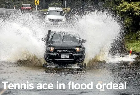  ?? ?? Tennis ace in flood ordeal Torrential downpours in recent weeks in northern New Zealand have made driving a potentiall­y hazardous affair, as Davis Cup player Rubin Statham can attest.