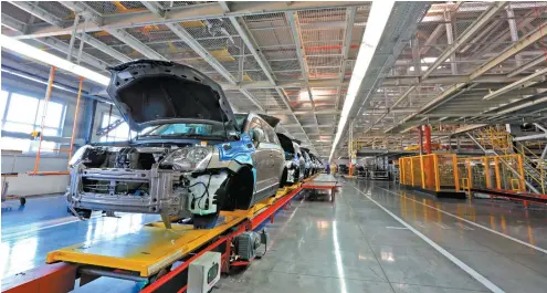  ??  ?? Audi se enfocará en la puesta en marcha de una fábrica inteligent­e.