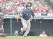  ?? JASON MILLER — GETTY IMAGES ?? The Tampa Bay Rays’ Nelson Cruz hits a solo homer during the third inning against the Cleveland Indians at Progressiv­e Field on Friday in Cleveland.