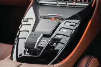 ??  ?? Left: AMG GT 63’s cabin is appropriat­ely lavish considerin­g the price; it definitely feels the most expensive with the two massive screens, utterly gorgeous flat-bottom Alcantara-clad steering wheel and a centre console that apes the GT 63 Coupe’s