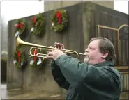  ?? LAUREN A. LITTLE — MEDIANEWS GROUP ?? George Boyd plays taps at Forest Hills.