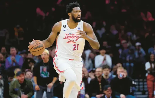  ?? MATT SLOCUM/AP PHOTOS ?? The 76ers’ Joel Embiid dribbles upcourt during Sunday’s game in Philadelph­ia.