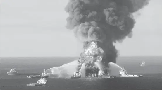  ?? Us Coast Guard / New York Times ?? Fire boats battle the blazing remnants of the Deepwater Horizon platform in the Gulf of Mexico on April 21, 2010. The Trump administra­tion has pursued a rollback of Obama-era regulation­s in the Gulf of Mexico, including safety measures put in place...