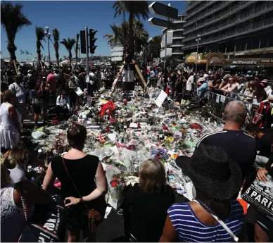  ??  ?? Below left: In July 2016, a French-Algerian jihadist drove a 19-tonne truck along the crowded Promenade des Anglais in Nice, killing 86 people.