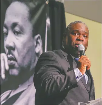  ?? FILE PHOTO ?? The Rev. Cecil Gibson delivers an impassione­d interpreta­tion of Dr. Martin Luther King Jr.’s “I Have a Dream” speech at an event honoring King’s birthday last year in Little Rock. A series of four programs starting Tuesday at the Fayettevil­le Public...