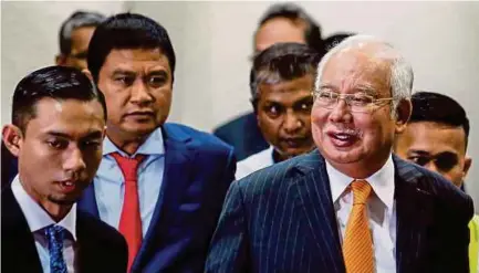  ??  ?? Former prime minister Datuk Seri Najib Razak at the Kuala Lumpur Courts Complex yesterday.