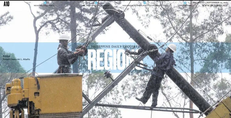  ?? —NEIL CLARK ONGCHANGCO ?? ALL-WEATHER JOB Linemen of the Benguet Electric Cooperativ­e (Beneco) work through heavy rain to repair a power line and restore the supply of electricit­y in a section of Baguio City. Local officials invited the Beneco general manager to the city council session this week to explain the increase in power rates.