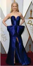  ??  ?? Nicole Kidman is stunning in this blue Armani Privé gown.