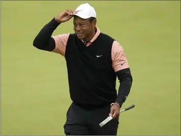  ?? SUE OGROCKI — THE ASSOCIATED PRESS ?? Tiger Woods withdrew after shooting a 79on Saturday during the third round of the PGA Championsh­ip at Southern Hills.