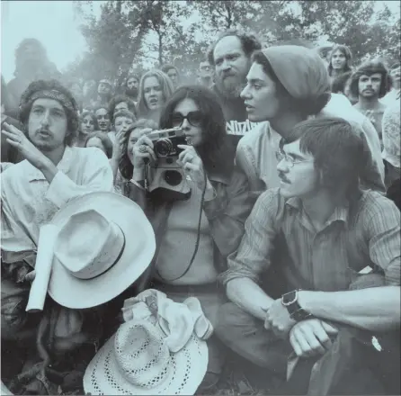  ??  ?? Dylan at Mariposa Folk Festival, Olympic Island, Toronto,
1972
