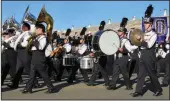  ?? SHUMESA MOHSIN/SPECIAL TO THE NEWS-SENTINEL ?? Tokay High School’s marching band performs at the Grape Bowl Classic Band Review on Saturday.