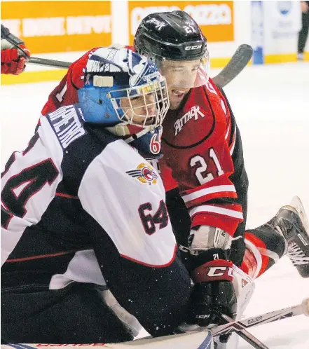  ?? — POSTMEDIA NEWS FILES ?? The Owen Sound Attack’s Jonah Gadjovich, right, and Windsor Spitfires’ Michael DiPietro got to know each other during the OHL season. Now, both are part of the Canucks organizati­on.