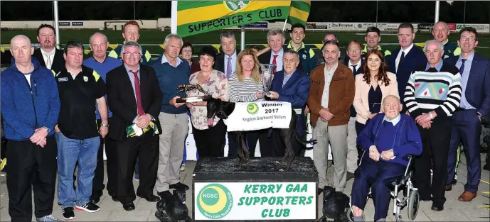  ??  ?? John King (Kerry Supporters Club secretary) presents the Kerry Supporters Club Trophy to Corona Ryan, and Donal O’Leary (ChairmanMa­n Kerry Supporters Club) presents the Race of Champions Trophy to Pauline Buckley after Killinan Rosie won the Kerry GAA...