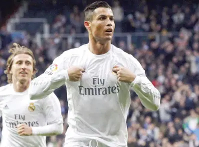  ?? ANSA ?? Cristiano Ronaldo, 30 anni, celebra il suo secondo gol alla Real Sociedad