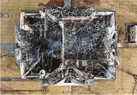  ?? Associated Press ?? A drone photo by the Texas State Fire Marshal’s Office shows the aftermath of a fire at Mason County’s “grand old lady.” Investigat­ors suspect arson in the Thursday fire and another blaze about the same time at a house a mile away.