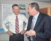  ?? File, Mark Long / AP ?? University of Florida athletic director Scott Stricklin (left) moved quickly to hire Dan Mullen, one of the few proven football coaches available this year.