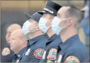  ?? SHERRY LAVARS — MARIN INDEPENDEN­T JOURNAL ?? San Rafael firefighte­rs and police officers gathered to remember the lives lost in the Sept. 11, 2001, attacks.