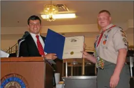  ?? SUBMITTED ?? Tim Villari, legislativ­e aide to state Sen. Gayle Manning, left, poses with Eagle Scout RJ Prusha.