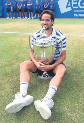  ?? Picture: EPA ?? POSITIVE. Spanish journeyman Feliciano Lopez fancies his chances at Wimbledon after beating Marin Cilic to be crowned the king of Queen’s in London on Sunday.