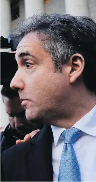  ?? JULIE JACOBSON / THE ASSOCIATED PRESS ?? U.S. President Donald Trump left for the G20 summit while his former lawyer, Michael Cohen, appeared in court.