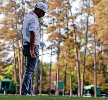  ?? CURTIS COMPTON/CURTIS.COMPTON@AJC.COM ?? Xander Schauffele reacts after hitting his tee shot into the water on the 16th hole Sunday at Augusta National. Schauffele took a triple-bogey 6 to effectivel­y end his title chances.