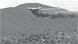  ?? ROB SCHUMACHER/THE REPUBLIC ?? Aerial crews battling the Goodwin Fire near Prescott have been grounded twice in recent days as civilian drones entered nearby airspace.