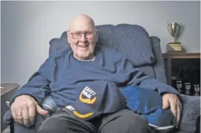  ?? STAFF PHOTO BY TROY STOLT ?? World War II veteran Richard T. Carbaugh Sr. poses for a portrait recently in Dalton, Ga.