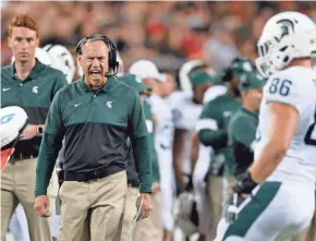  ?? ASSOCIATED PRESS ?? Michigan State coach Mark Dantonio didn’t like too much of what he saw during his team’s 34-10 loss to Ohio State last week.