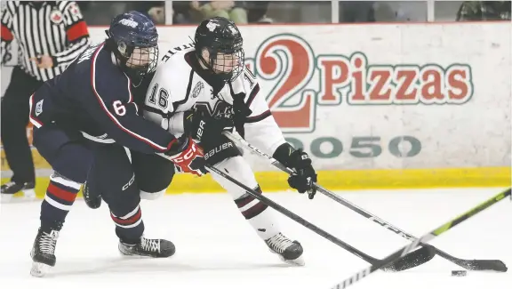  ?? PHOTOS: MARK MALONE ?? Chatham Maroons' Cale Marontate, right, battles Lasalle Vipers' Ryan Clark in Game 6 of their GOJHL Western Conference quarterfin­al at Chatham Memorial Arena