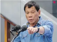  ?? BULLIT MARQUEZ / THE ASSOCIATED PRESS ?? Philippine President Rodrigo Duterte is under fire for comments suggesting troops should shoot female rebels in the genitals to make them “useless.”