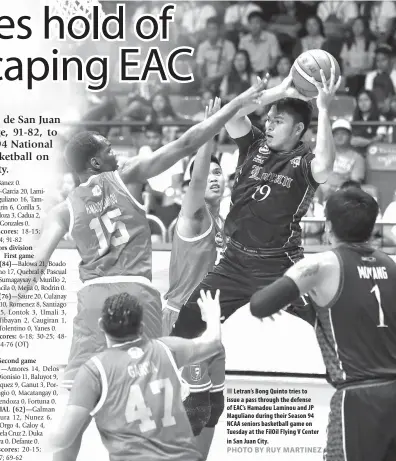  ??  ?? Letran’s Bong Quinto tries to issue a pass through the defense of EAC’s Hamadou Laminou and JP Maguliano during their Season 94 NCAA seniors basketball game on Tuesday at the FilOil Flying V Center in San Juan City.