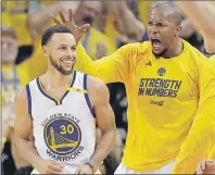  ?? AP PHOTO ?? In this file photo, Golden State Warriors’ Stephen Curry, left, celebrates with teammate David West after a scoring during NBA playoff action Tuesday night against the Utah Jazz in Oakland, Calif.