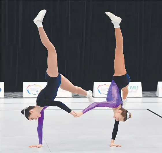  ?? Picture: GYMNASTICS AUSTRALIA/WINKIPOP MEDIA ?? Melbourne Girls' College pair Evelyn Gamon and Charlotte Bourke compete at the AeroSchool­s Australian Championsh­ips.