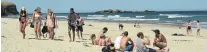  ?? PHOTO: LINDA ROBERTSON ?? Soaking it up . . . People enjoy the sun at Tomahawk Beach last month.