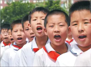  ?? JIN LIANGKUAI / XINHUA ?? Boys in Heibei province attend an event designed to promote bravery.