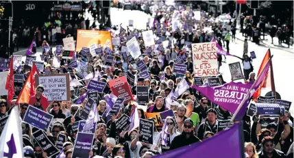  ?? Photo: The Guardian ?? Nurses marched in Auckland, New Zealand, yesterday, striking for the first time in 30 years, after rejecting the latest pay offer.