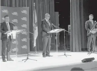  ??  ?? Randy Delorey, Labi Kousoulis and Iain Rankin take part in a Liberal leadership candidates debate in Halifax on Thursday, Nov. 19.