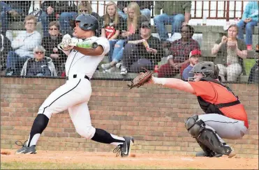  ??  ?? Ridgeland’s Shawn Wilson puts a charge into a pitch during Game 2 of the Panthers’ series with LaFayette last week. Ridgeland won two of three from the Ramblers and went into this week tied with Pickens for second place in the region standings. (Photo...