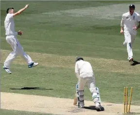  ?? GALLO IMAGES ?? FLYING: England fast bowler James Anderson celebrates taking the wicket of Australian captain Michael Clarke on the second day of the Melbourne Test.