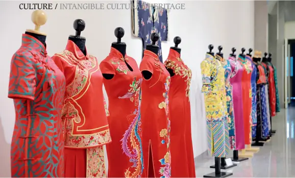  ??  ?? Cheongsams designed and made by Zhang Fenglan, fifth-generation inheritor of traditiona­l Beijing-style cheongsam making skills.