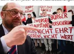  ??  ?? Dieser Weg wird kein leichter sein: SPD-Chef Schulz und GroKo-Gegner.